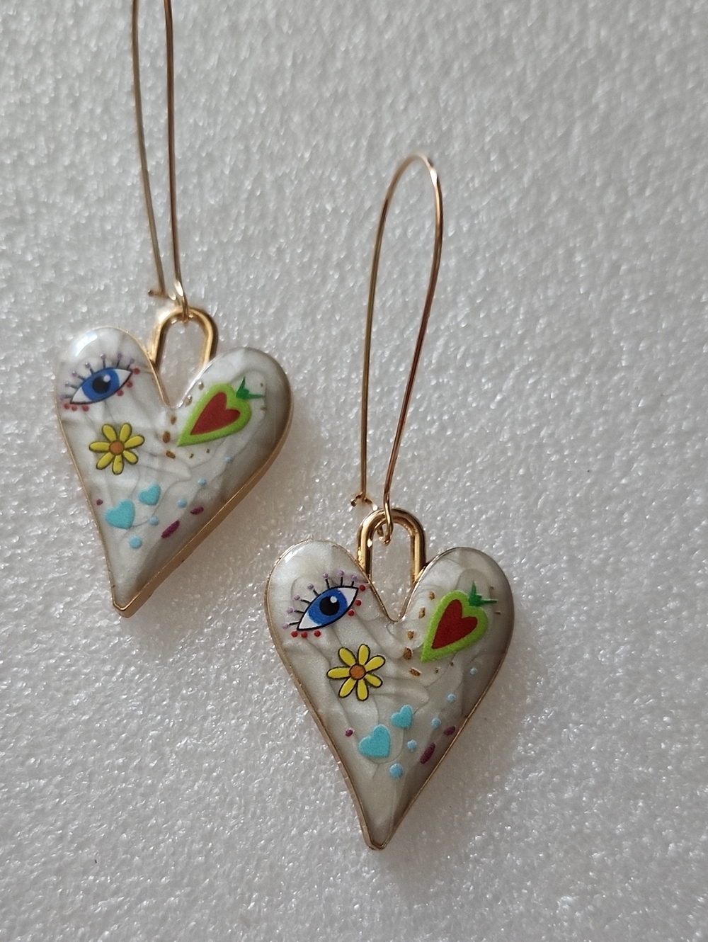 Hand Crafted White Heart Earrings with Blue Eye and Green Red Accents